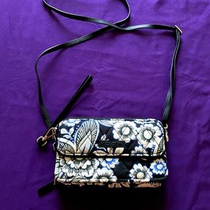 Retired Vera Bradley RFID all in one crossbody wallet. Pattern Snow Lotus